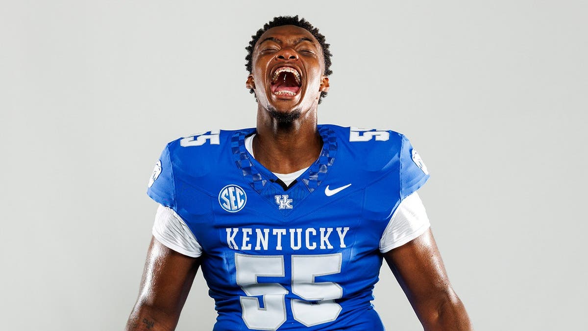 Kentucky football player Nic Smith poses during a photo shoot.