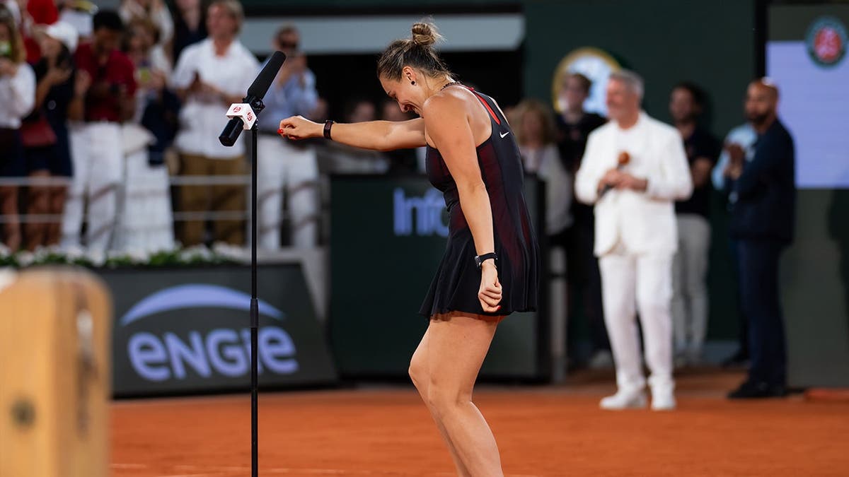 Aryna Sabalenka dancing during a post-match interview at the French Open in Paris