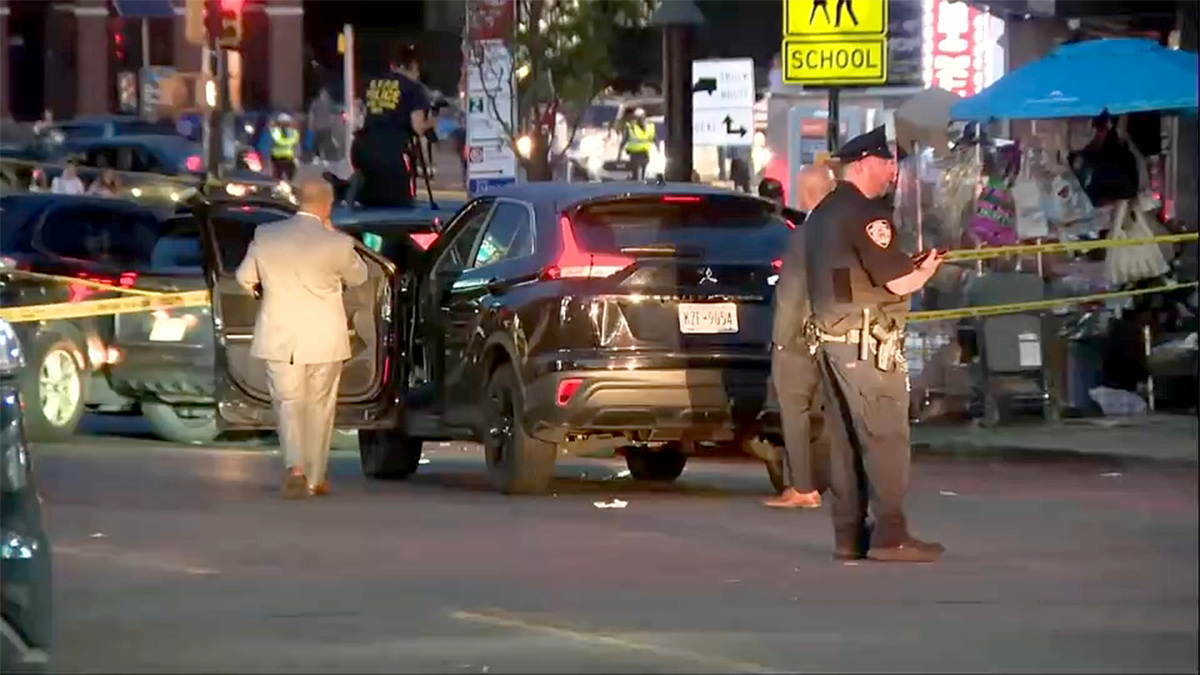 Police officers after a shooting in NYC