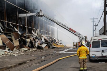 Race against time in fight against 500,000sqf LA inferno amid fears of biohazard fallout