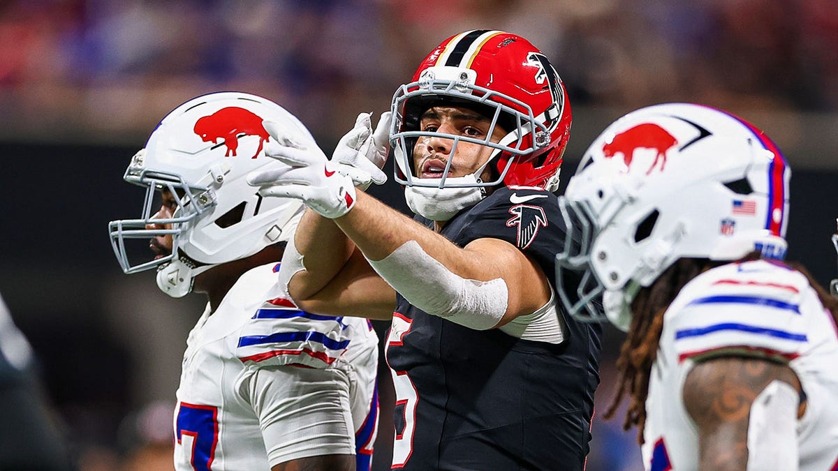 Drake London of the Atlanta Falcons celebrating after a catch at Mercedes-Benz Stadium