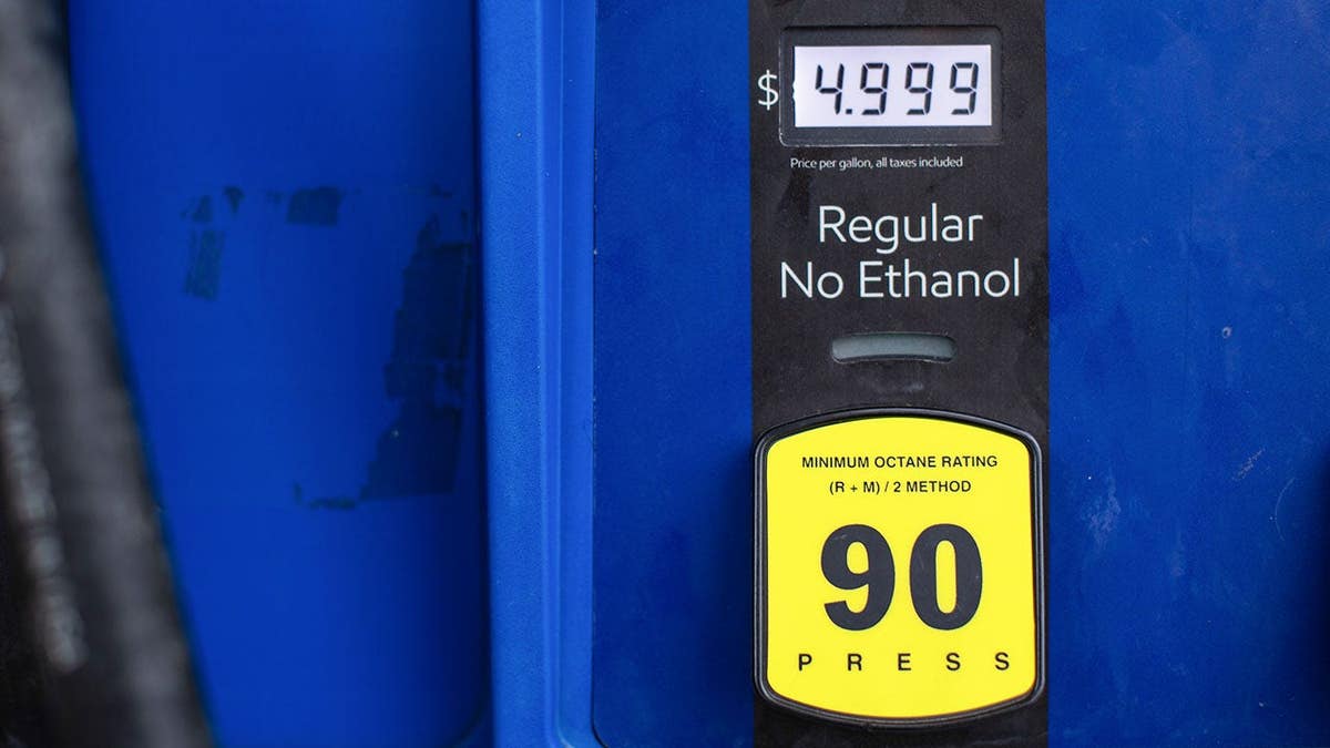 Gas pump displaying ethanol-free gasoline price at Exxon gas station in Austin, Texas
