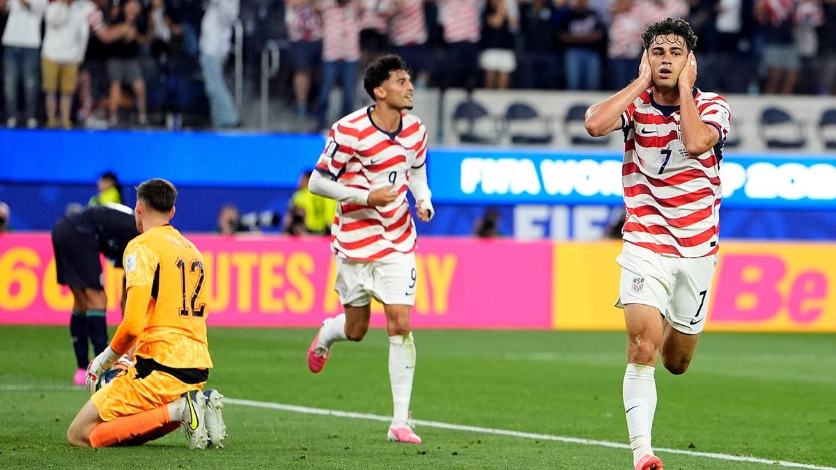 United States' Giovanni Reyna celebrating after scoring a goal during a soccer match in Inglewood, Calif.