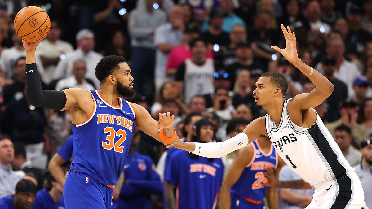 Karl-Anthony Towns and Victor Wembanyama during the NBA Finals