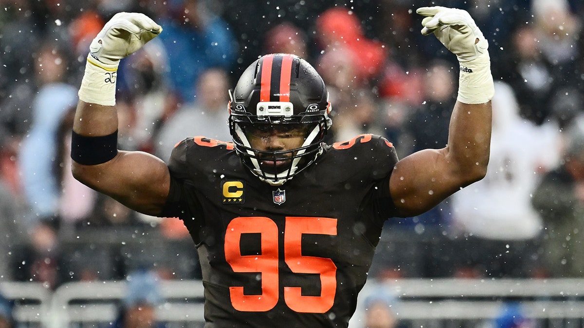 Myles Garrett celebrating on the field during a game at Huntington Bank Field