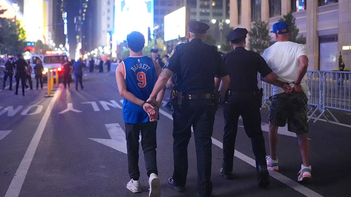 Thousands of New York Knicks fans celebrating inside and outside Madison Square Garden