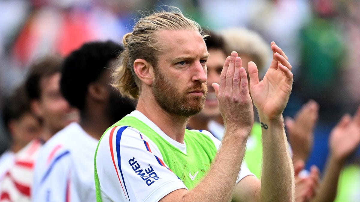 United States defender Tim Ream clapping at Bank of America Stadium