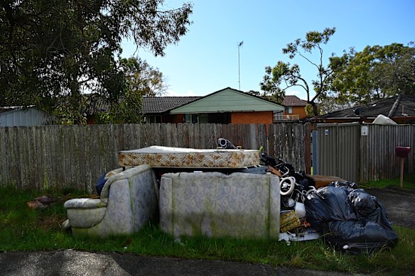 Rubbish and household items discarded near homes in Gorokan