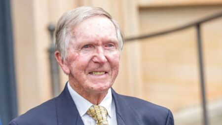 Reclusive businessman steps down from a dozen companies