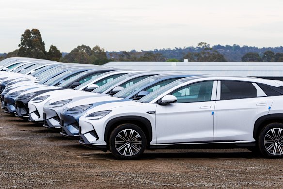 Imported BYD electric vehicles parked in a storage yard in Melbourne in 2025.
