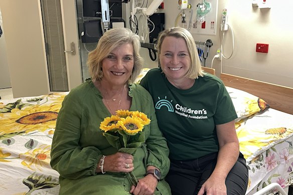 Jenny Jenner and Kerry Williams with the Queensland Children’s Hospital’s new cuddle bed. 