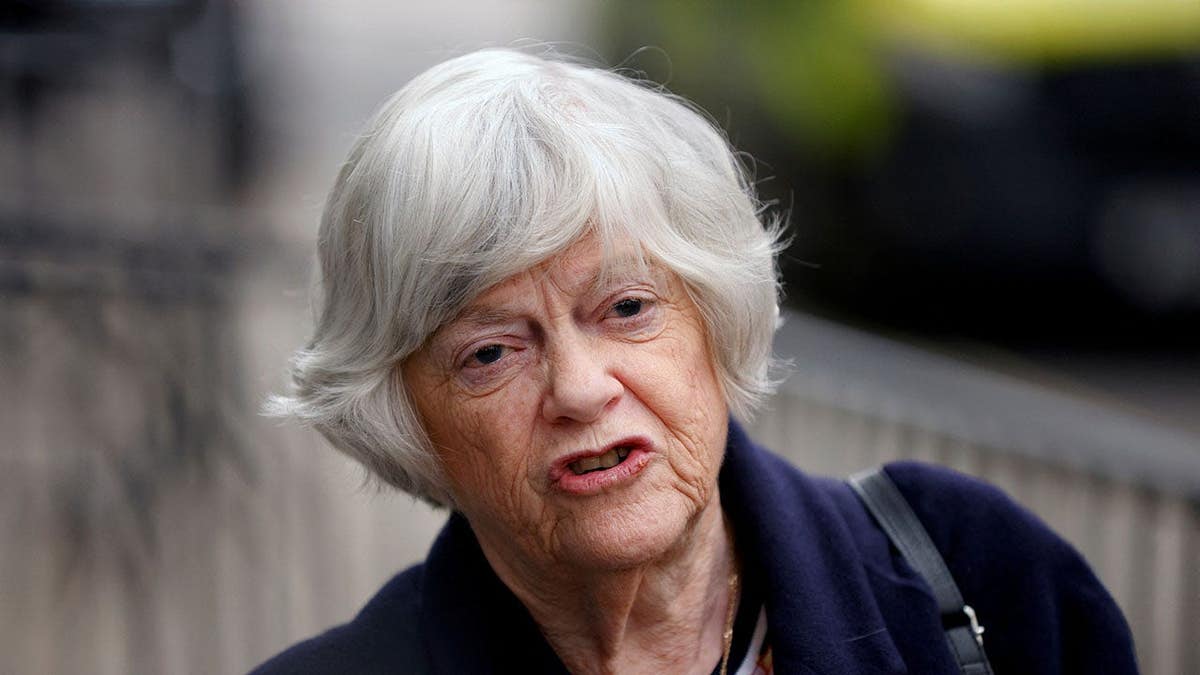 Ann Widdecombe reads a statement outside the Old Bailey in London.