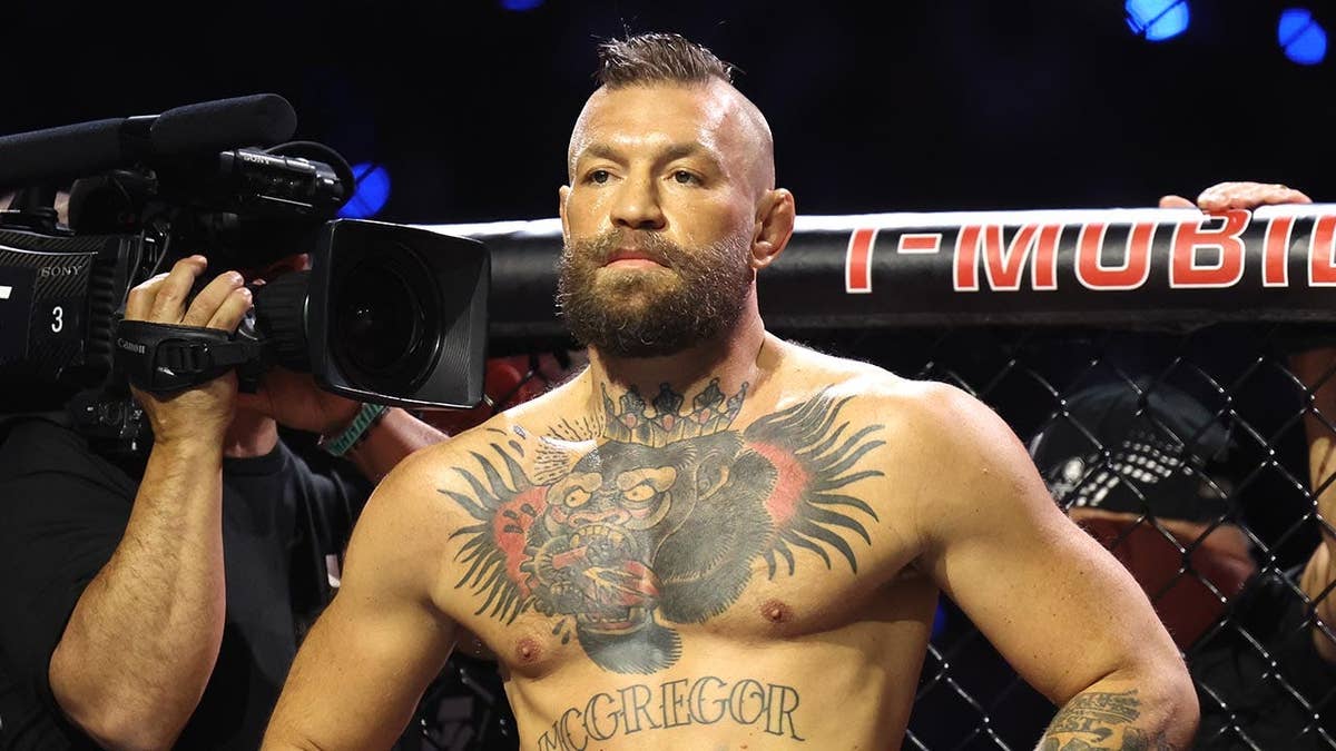 Conor McGregor walks out before a welterweight bout at T-Mobile Arena.