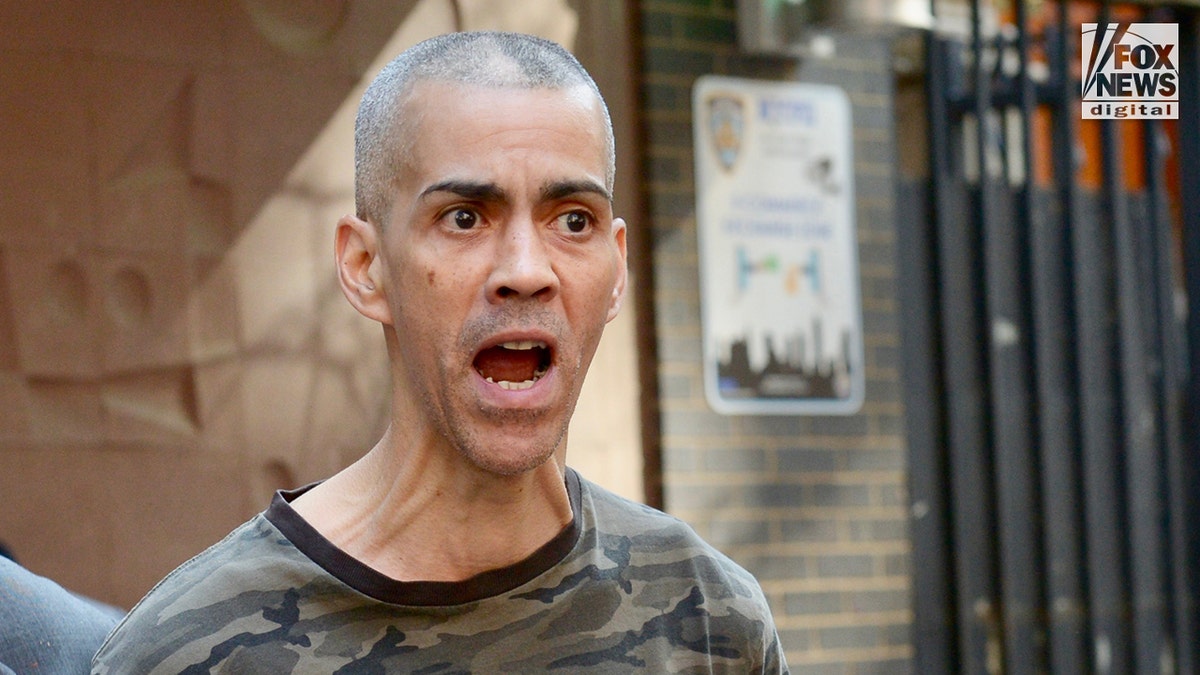 Anti-semitic stabbing suspect is walked out of the 20th precinct