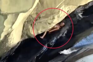 Moment woman crunches herself on rocks at Santa Paula Punch Bowls in Ventura County