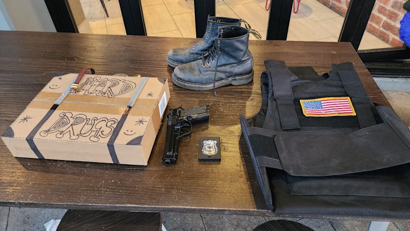 Two men arrested, fake gun and bulletproof vest seized