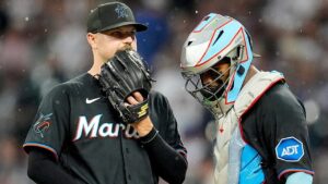Marlins outfielders collide, knock fly ball over wall to give Braves star a home run in brutal mishap