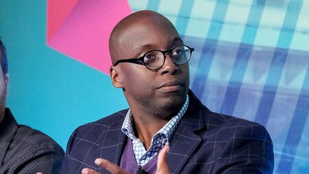 Sports commentator Michael Holley is 'fine' after fainting during live broadcast in terrifying scene
