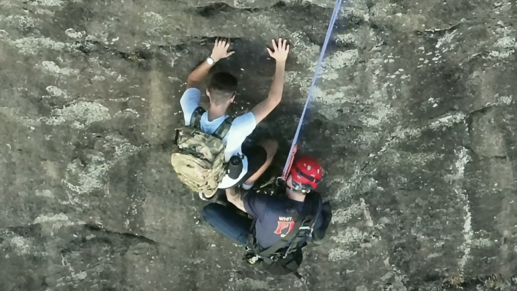 Free climber stranded on Georgia rock face calls 911, prompting dramatic rescue by firefighter