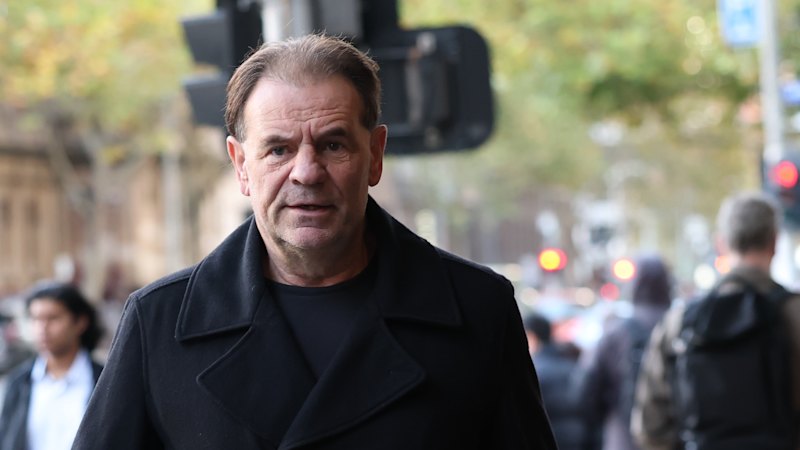 Former construction boss arrested and charged over alleged threats to CFMEU officials