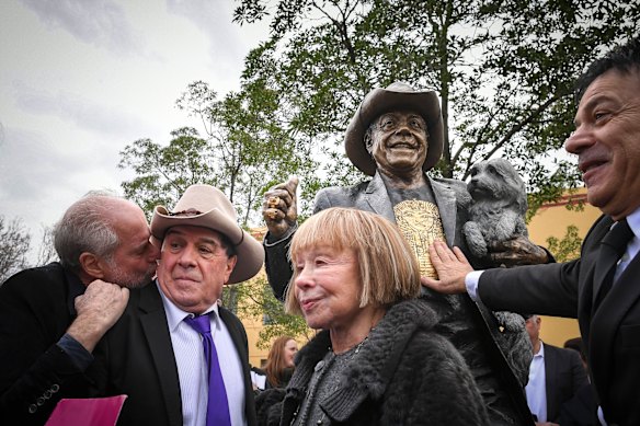Michael Gudinski, Molly Meldrum, Jeanne Pratt and Ralph Carr share a moment during the launch Molly Meldrum statue in Richmond.