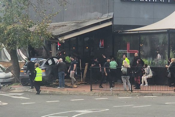 Police are investigating after a woman was killed when a car crashed into a cafe at a shopping centre in Wantirna South.