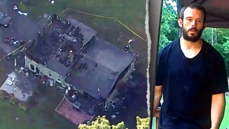 Police nab 'armed and dangerous' New York fugitive suspected of killing father and torching home