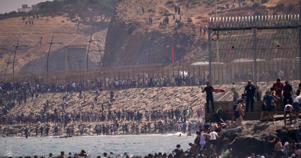Spain deploys military to Ceuta after thousands of migrant crossings at Morocco border; at least 34 dead
