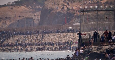 Spain deploys military to Ceuta after thousands of migrant crossings at Morocco border; at least 34 dead