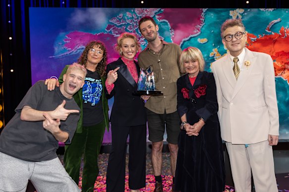 Race Around the World winner Elliot Constable (middle) with (from left) judge Danny Philippou, former winner Olivia Rousett, host Zan Rowe, judge Margaret Pomeranz and judge and former contestant John Safran.