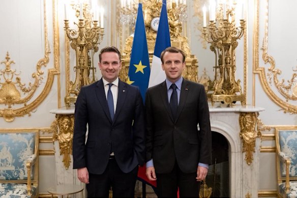 Brendan Berne (left), pictured with French President Emmanuel Macron, is a former ambassador now focused on creative projects.