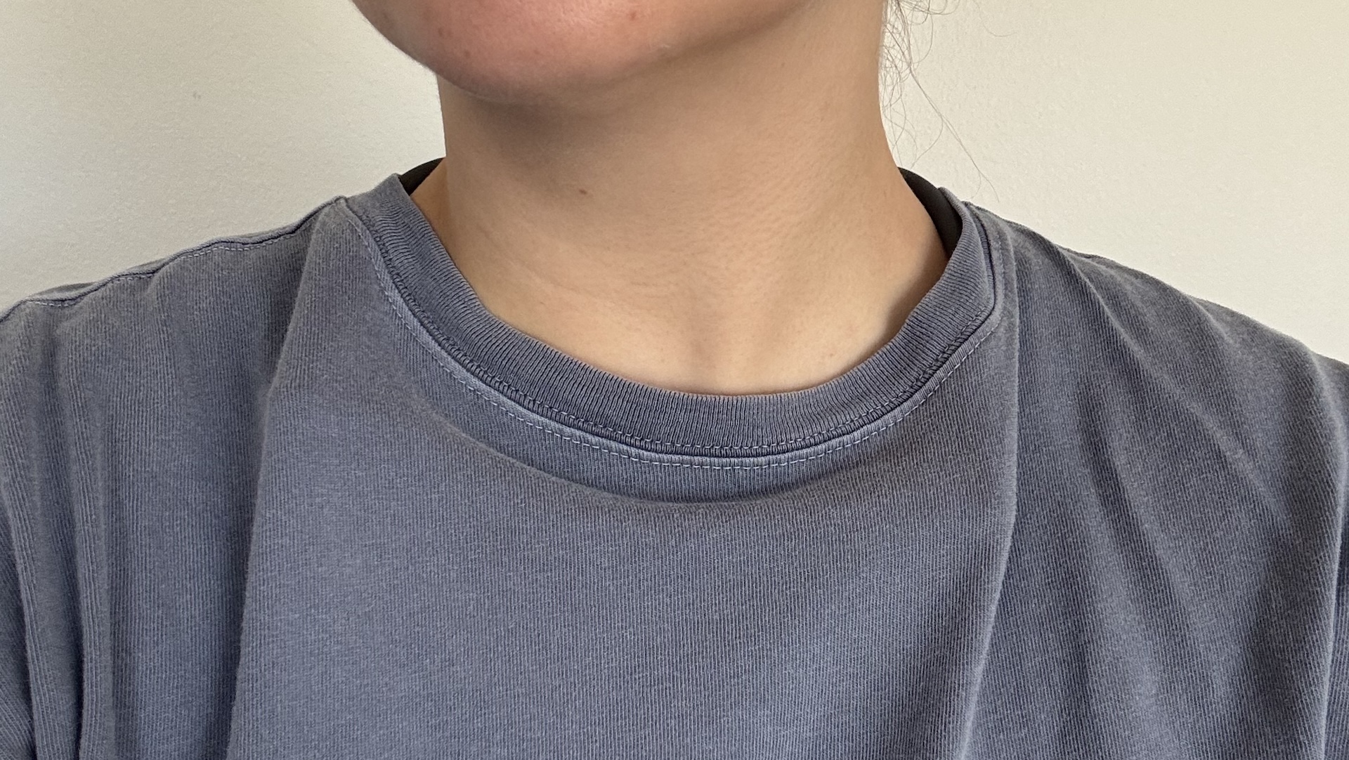 The Sony Reon Pocket Pro Plus under a blue T-shirt.