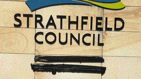 Indigenous references covered with tape following controversial motion
