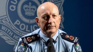 Mourners gather in Brisbane to farewell former police commissioner