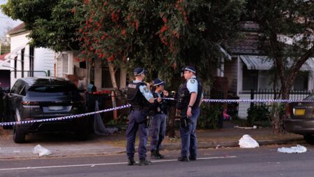 Three-year-old girl killed in western Sydney car crash, driver charged with negligent driving occasioning death