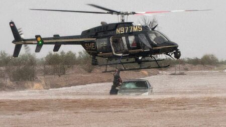 Arizona sheriff deploys helicopter to save 2 stranded in flooded car