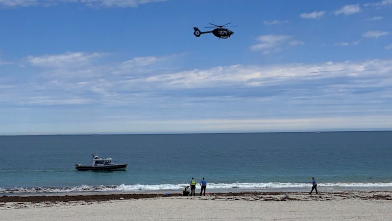 Swimmer missing, beach closed after suspected shark attack at popular Perth beach