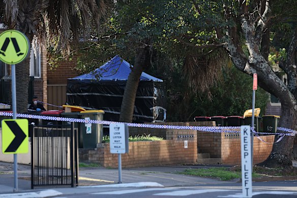 Police cordoned off Harrow Road, Auburn, following the grim discovery.
