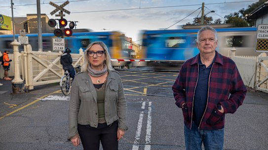 Yarraville locals are divided on plans to remove a level crossing. Robert Price and Louise Beach fear it will transform the suburb for the worse.