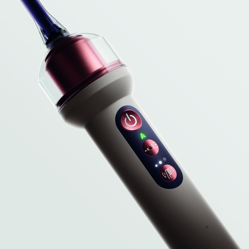 A close-up of the pink Dyson CameraJet's modes.