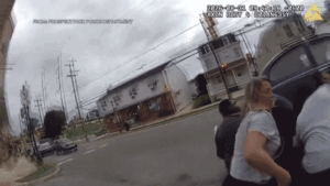 WATCH: Bystanders, police lift Volkswagen off woman pinned underneath after dramatic e-bike crash
