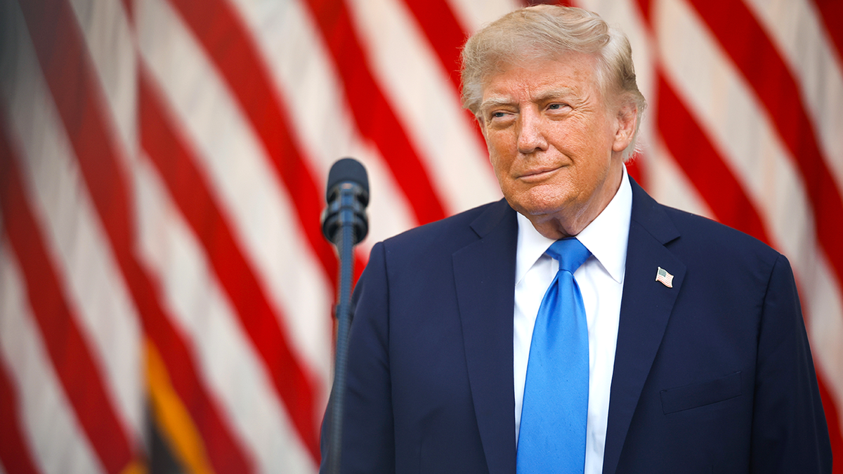 President Donald Trump arrives for White House Rose Garden dinner.