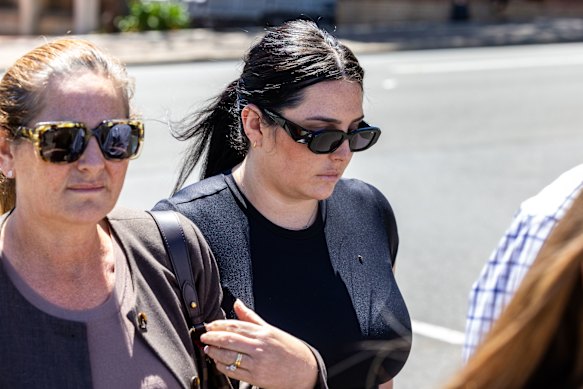 Tayla Brailey (right) departs surrounded by family at Campbelltown Local Court, Wednesday, December 3, 2025.