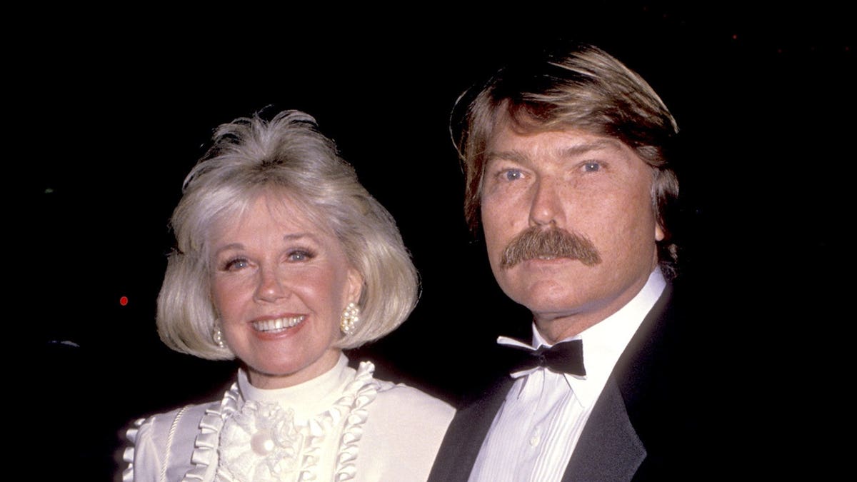 Doris Day and Terry Melcher pose together.