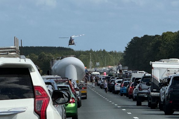 Emergency services were working to free one person trapped in the crash. 