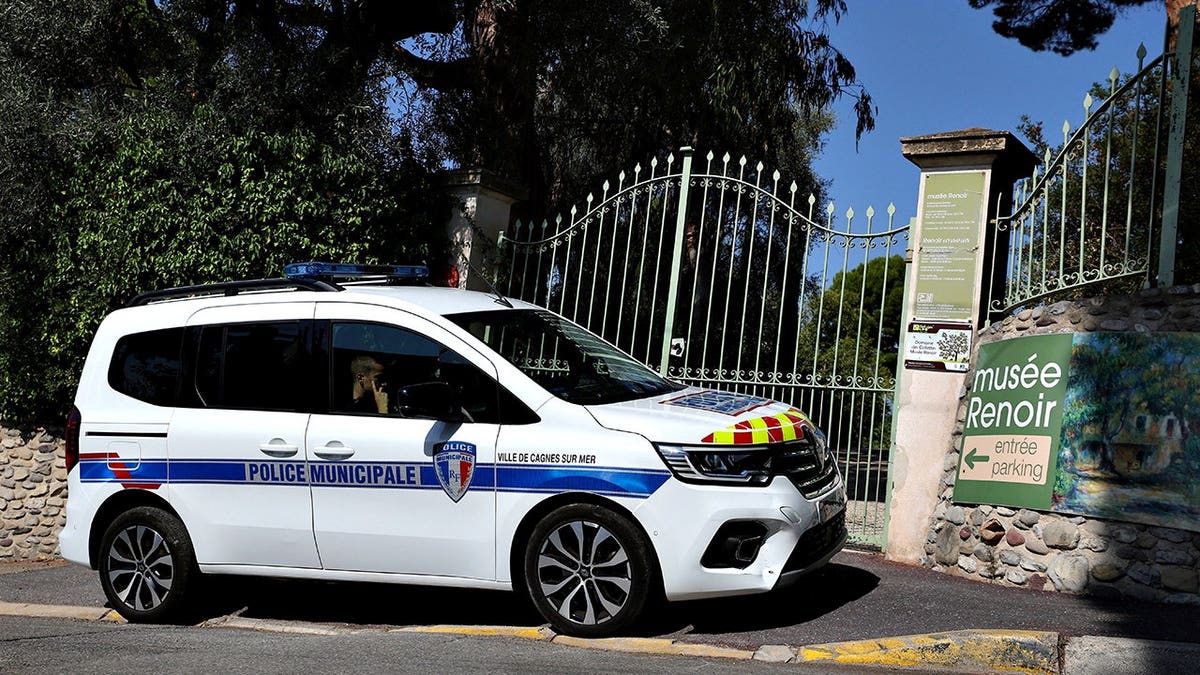 French municipal police car parked outside Renoir Museum entrance in Cagnes-sur-Mer.
