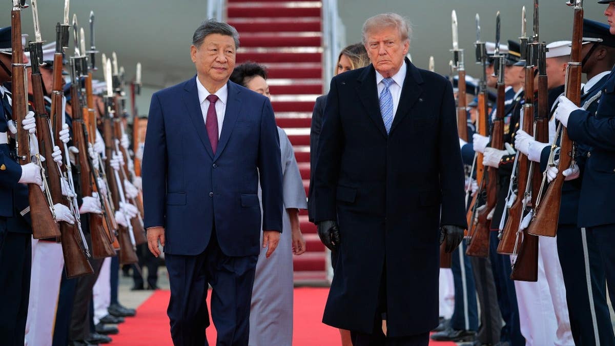 President Donald Trump greets Chinese President Xi Jinping