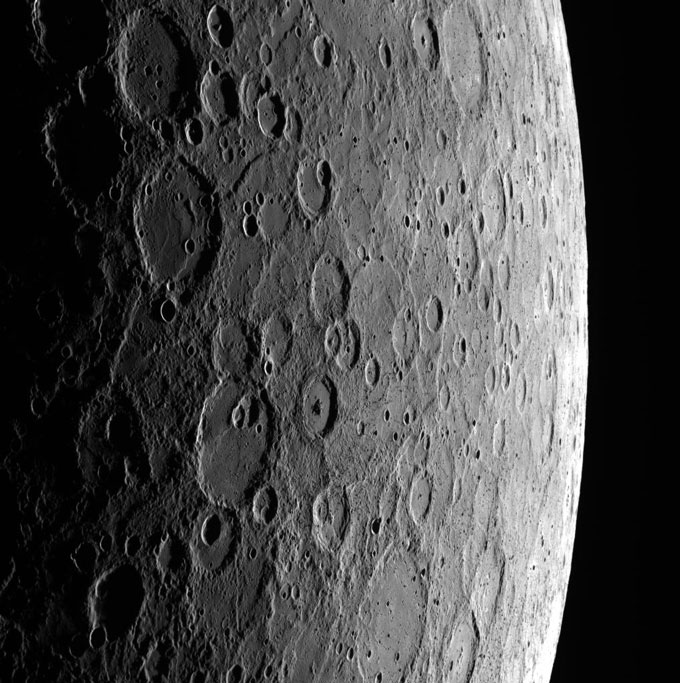 A close-up of the lunar surface from the day/night dividing line to the edge of its visible sphere.