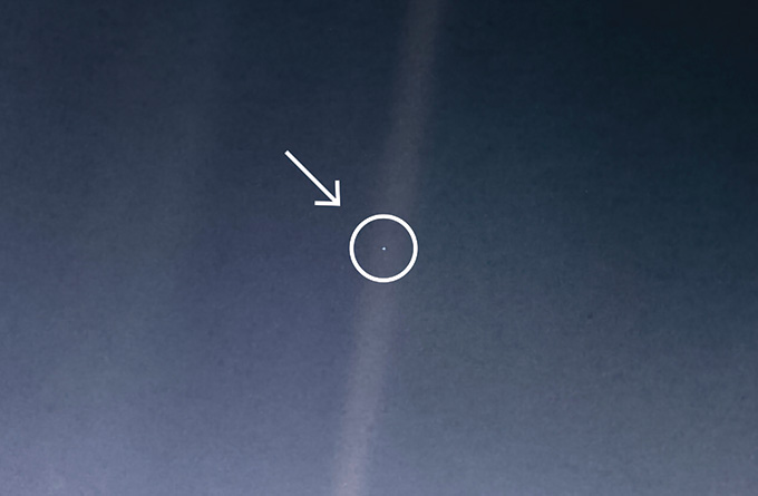 An image that Voyager 1 took of the planets it had past, with Earth shown encircled as a "pale blue dot."