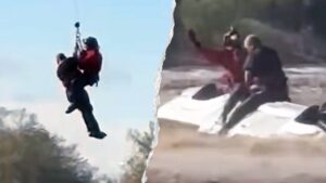 Arizona sheriff's helicopter crew rescues man stranded atop overturned truck in rapidly rising floodwaters
